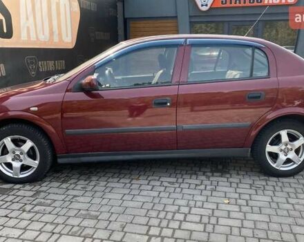Красный Опель Астра, объемом двигателя 1.6 л и пробегом 218 тыс. км за 3900 $, фото 8 на Automoto.ua