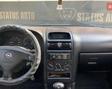 Красный Опель Астра, объемом двигателя 1.6 л и пробегом 218 тыс. км за 3900 $, фото 18 на Automoto.ua