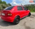 Красный Опель Астра, объемом двигателя 1.8 л и пробегом 319 тыс. км за 2350 $, фото 1 на Automoto.ua