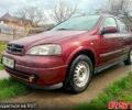 Красный Опель Астра, объемом двигателя 1.6 л и пробегом 251 тыс. км за 3000 $, фото 1 на Automoto.ua