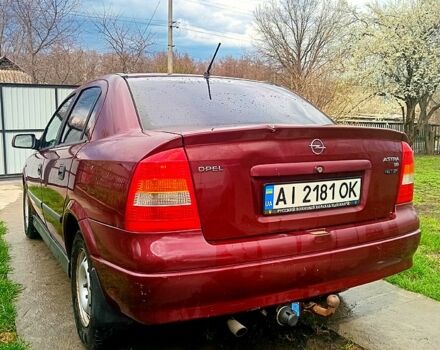 Красный Опель Астра, объемом двигателя 1.6 л и пробегом 251 тыс. км за 3000 $, фото 2 на Automoto.ua
