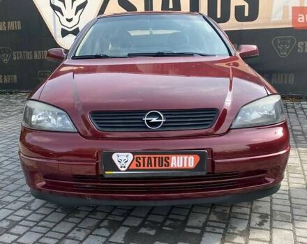 Красный Опель Астра, объемом двигателя 1.6 л и пробегом 218 тыс. км за 3900 $, фото 2 на Automoto.ua