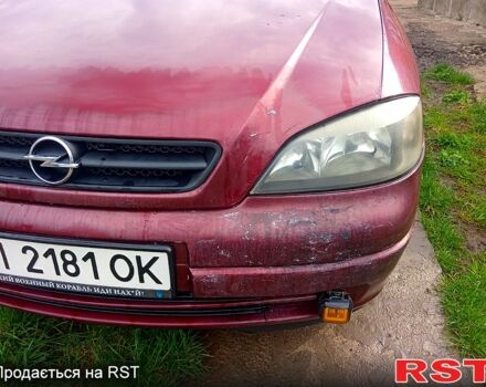 Красный Опель Астра, объемом двигателя 1.6 л и пробегом 251 тыс. км за 3000 $, фото 3 на Automoto.ua