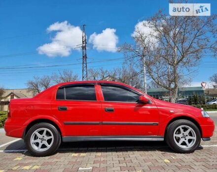 Красный Опель Астра, объемом двигателя 1.6 л и пробегом 224 тыс. км за 4500 $, фото 2 на Automoto.ua