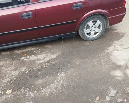 Червоний Опель Астра, об'ємом двигуна 1.4 л та пробігом 247 тис. км за 2300 $, фото 7 на Automoto.ua