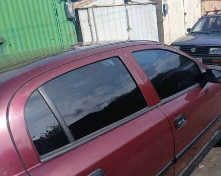 Червоний Опель Астра, об'ємом двигуна 1.4 л та пробігом 247 тис. км за 2300 $, фото 24 на Automoto.ua