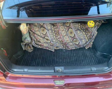 Красный Опель Астра, объемом двигателя 1.6 л и пробегом 285 тыс. км за 3000 $, фото 13 на Automoto.ua