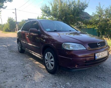 Красный Опель Астра, объемом двигателя 1.6 л и пробегом 285 тыс. км за 3000 $, фото 1 на Automoto.ua