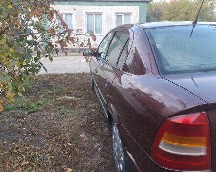 Червоний Опель Астра, об'ємом двигуна 1 л та пробігом 230 тис. км за 4000 $, фото 3 на Automoto.ua