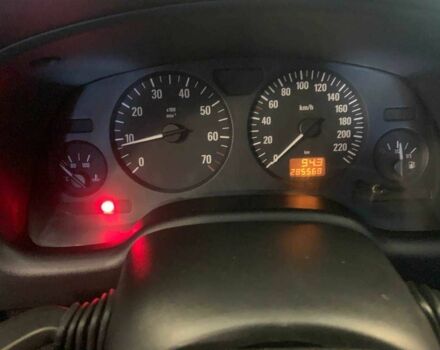 Красный Опель Астра, объемом двигателя 1.6 л и пробегом 285 тыс. км за 3000 $, фото 10 на Automoto.ua