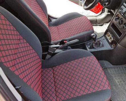 Красный Опель Астра, объемом двигателя 1.6 л и пробегом 224 тыс. км за 4500 $, фото 7 на Automoto.ua