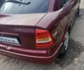 Червоний Опель Астра, об'ємом двигуна 1.4 л та пробігом 247 тис. км за 2300 $, фото 1 на Automoto.ua