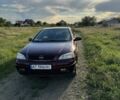 Красный Опель Астра, объемом двигателя 1.4 л и пробегом 183 тыс. км за 3421 $, фото 1 на Automoto.ua