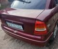 Червоний Опель Астра, об'ємом двигуна 1.4 л та пробігом 247 тис. км за 2300 $, фото 3 на Automoto.ua