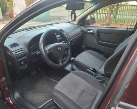 Червоний Опель Астра, об'ємом двигуна 1 л та пробігом 230 тис. км за 4000 $, фото 5 на Automoto.ua