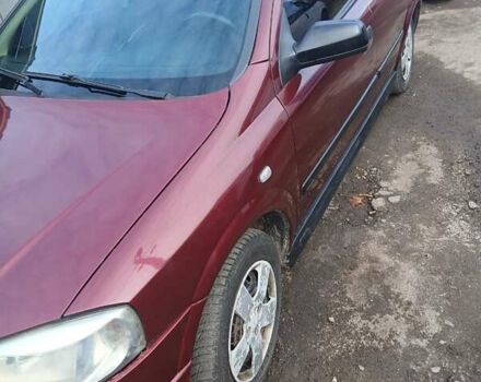 Червоний Опель Астра, об'ємом двигуна 1.4 л та пробігом 247 тис. км за 2300 $, фото 6 на Automoto.ua
