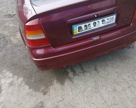 Червоний Опель Астра, об'ємом двигуна 1.4 л та пробігом 247 тис. км за 2300 $, фото 5 на Automoto.ua