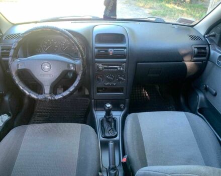 Красный Опель Астра, объемом двигателя 1.6 л и пробегом 285 тыс. км за 3000 $, фото 9 на Automoto.ua