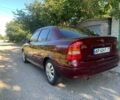 Красный Опель Астра, объемом двигателя 1.6 л и пробегом 285 тыс. км за 3000 $, фото 5 на Automoto.ua