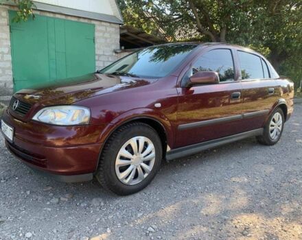 Красный Опель Астра, объемом двигателя 1.6 л и пробегом 285 тыс. км за 3000 $, фото 7 на Automoto.ua