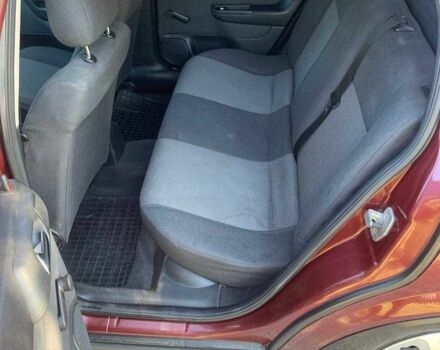 Красный Опель Астра, объемом двигателя 1.6 л и пробегом 285 тыс. км за 3000 $, фото 12 на Automoto.ua