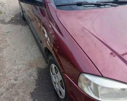 Червоний Опель Астра, об'ємом двигуна 1.4 л та пробігом 247 тис. км за 2300 $, фото 39 на Automoto.ua