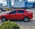 Красный Опель Астра, объемом двигателя 1.6 л и пробегом 224 тыс. км за 4500 $, фото 1 на Automoto.ua