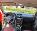Красный Опель Астра, объемом двигателя 1.6 л и пробегом 224 тыс. км за 4500 $, фото 4 на Automoto.ua