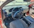 Красный Опель Астра, объемом двигателя 1.39 л и пробегом 180 тыс. км за 1700 $, фото 10 на Automoto.ua