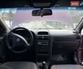 Красный Опель Астра, объемом двигателя 1.4 л и пробегом 250 тыс. км за 2400 $, фото 7 на Automoto.ua