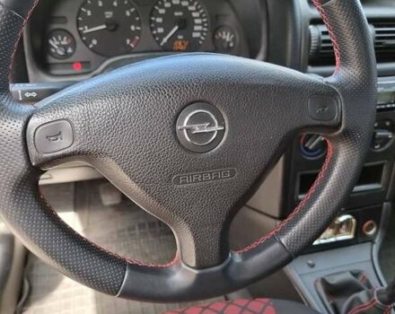 Красный Опель Астра, объемом двигателя 1.6 л и пробегом 224 тыс. км за 4500 $, фото 5 на Automoto.ua