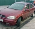 Красный Опель Астра, объемом двигателя 1.6 л и пробегом 313 тыс. км за 3550 $, фото 1 на Automoto.ua