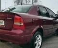 Красный Опель Астра, объемом двигателя 1.6 л и пробегом 313 тыс. км за 3550 $, фото 4 на Automoto.ua