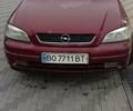 Красный Опель Астра, объемом двигателя 1.6 л и пробегом 313 тыс. км за 3550 $, фото 1 на Automoto.ua