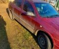 Красный Опель Астра, объемом двигателя 1.4 л и пробегом 100 тыс. км за 1100 $, фото 1 на Automoto.ua