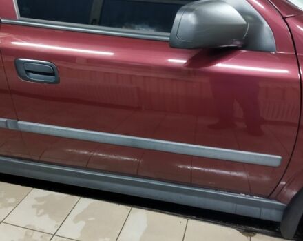 Красный Опель Астра, объемом двигателя 1.4 л и пробегом 420 тыс. км за 3200 $, фото 3 на Automoto.ua