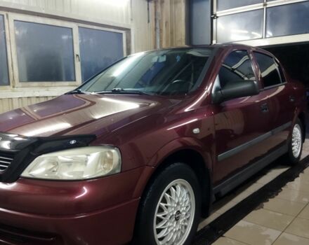 Красный Опель Астра, объемом двигателя 1.4 л и пробегом 420 тыс. км за 3200 $, фото 5 на Automoto.ua