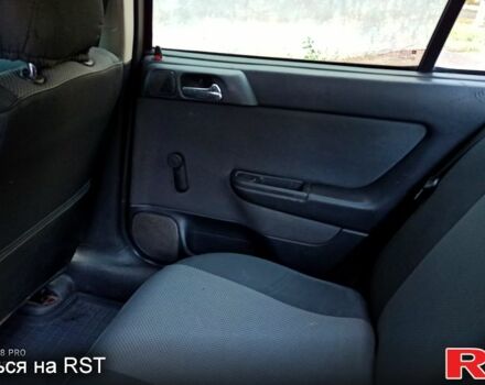 Червоний Опель Астра, об'ємом двигуна 1.4 л та пробігом 143 тис. км за 3650 $, фото 6 на Automoto.ua