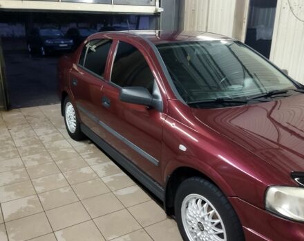 Красный Опель Астра, объемом двигателя 1.4 л и пробегом 420 тыс. км за 3200 $, фото 4 на Automoto.ua