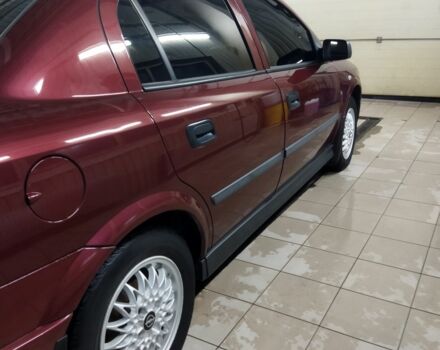 Красный Опель Астра, объемом двигателя 1.4 л и пробегом 420 тыс. км за 3200 $, фото 1 на Automoto.ua