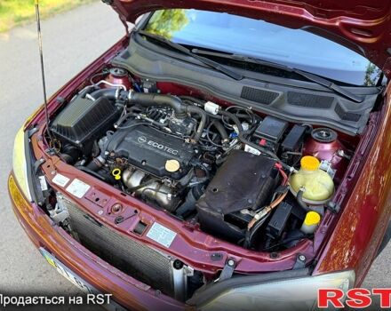 Червоний Опель Астра, об'ємом двигуна 1.4 л та пробігом 180 тис. км за 4000 $, фото 9 на Automoto.ua