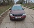 Красный Опель Астра, объемом двигателя 1.4 л и пробегом 170 тыс. км за 3300 $, фото 3 на Automoto.ua