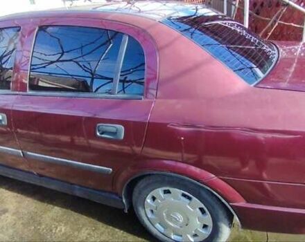 Красный Опель Астра, объемом двигателя 1.4 л и пробегом 297 тыс. км за 2500 $, фото 3 на Automoto.ua