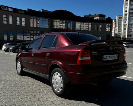 Красный Опель Астра, объемом двигателя 1.39 л и пробегом 185 тыс. км за 3700 $, фото 9 на Automoto.ua