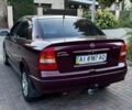Красный Опель Астра, объемом двигателя 1.4 л и пробегом 188 тыс. км за 2900 $, фото 4 на Automoto.ua