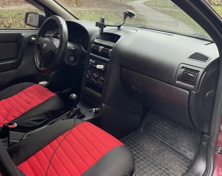 Червоний Опель Астра, об'ємом двигуна 1.4 л та пробігом 208 тис. км за 3600 $, фото 6 на Automoto.ua