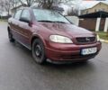 Красный Опель Астра, объемом двигателя 1.36 л и пробегом 327 тыс. км за 2900 $, фото 2 на Automoto.ua