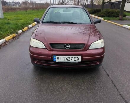 Красный Опель Астра, объемом двигателя 1.36 л и пробегом 327 тыс. км за 2900 $, фото 1 на Automoto.ua