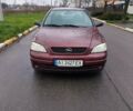 Красный Опель Астра, объемом двигателя 1.36 л и пробегом 327 тыс. км за 2900 $, фото 1 на Automoto.ua