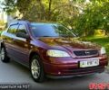 Червоний Опель Астра, об'ємом двигуна 1.4 л та пробігом 180 тис. км за 4000 $, фото 1 на Automoto.ua
